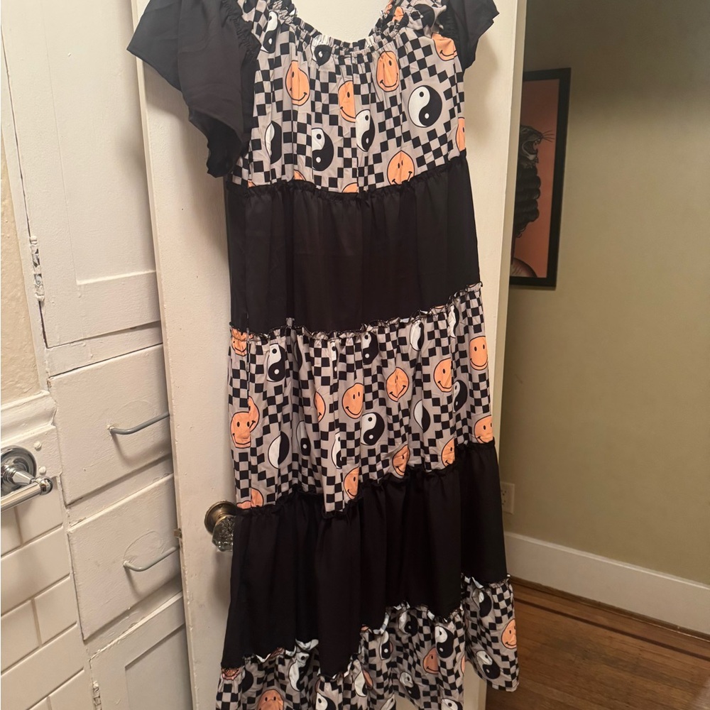 Dressed in LALA Black & Orange Yin Yang Smiley Checker Maxi Dress